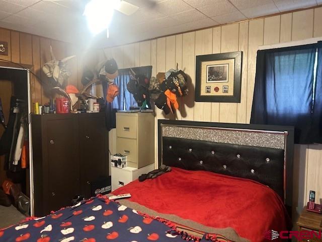 21148 H75 Road Delta, CO 81416 - Photo 6 of 30 a bedroom with a bed and a dresser