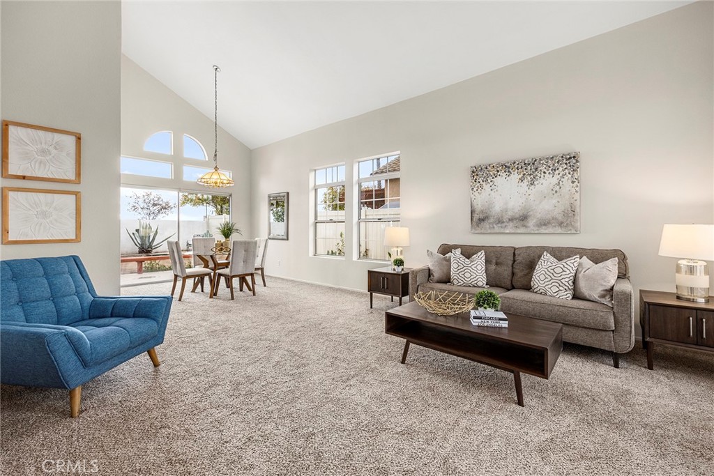20501 Red Poppy Lane Riverside, CA 92508 - Photo 1 of 1 a living room with furniture and a large window