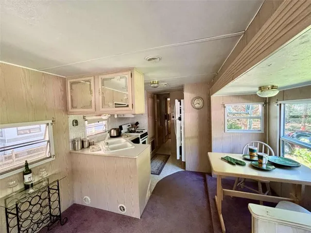 a bathroom with a sink and a window