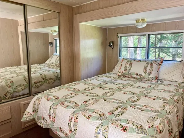 a view of outdoor space with a table and chairs