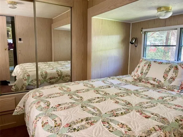 a view of a patio with a table and chairs