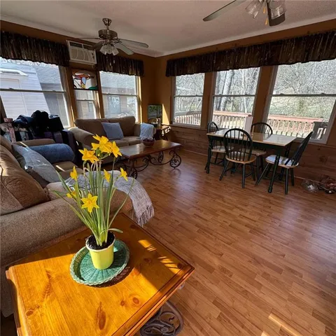 a view of a dining room with furniture window and outside view
