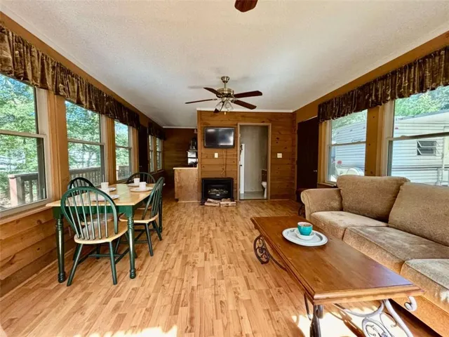 a view of kitchen with a sink and cabinets