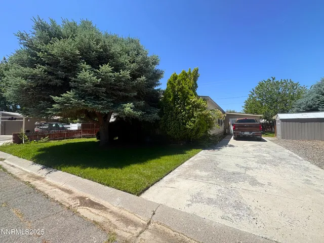 a car parked in front of a house