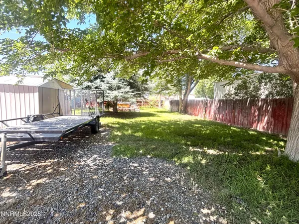 a view of a swimming pool with a garden