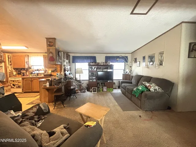 a bed room with furniture and a window