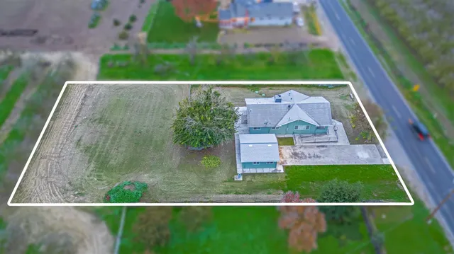 a view of swimming pool with a yard