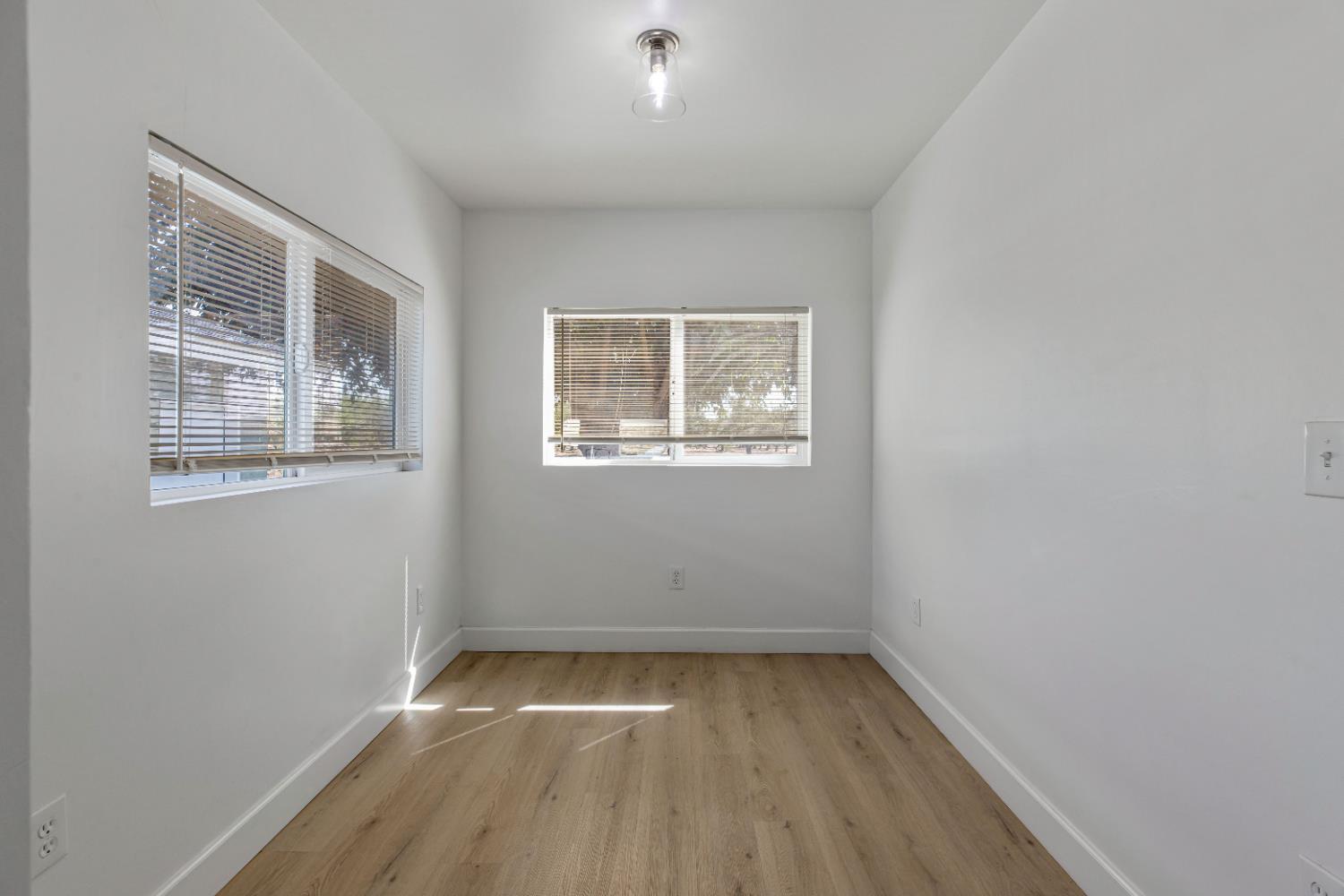 12484 South Union Road Manteca, CA 95336 - Photo 22 of 38 an empty room with a window