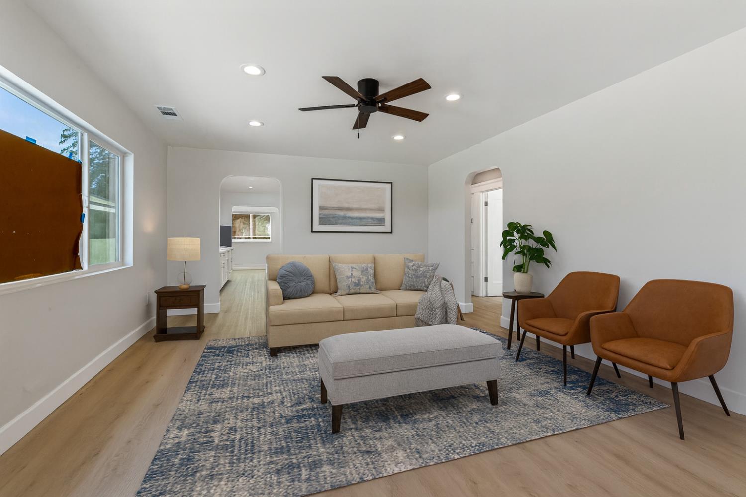 12484 South Union Road Manteca, CA 95336 - Photo 7 of 38 a living room with furniture and a window
