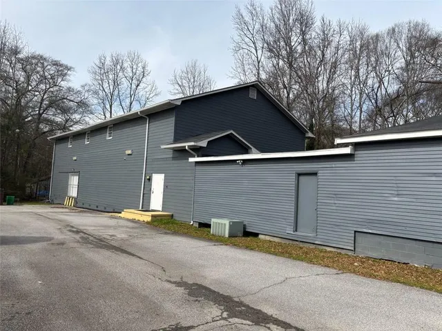a view of the house with a garage