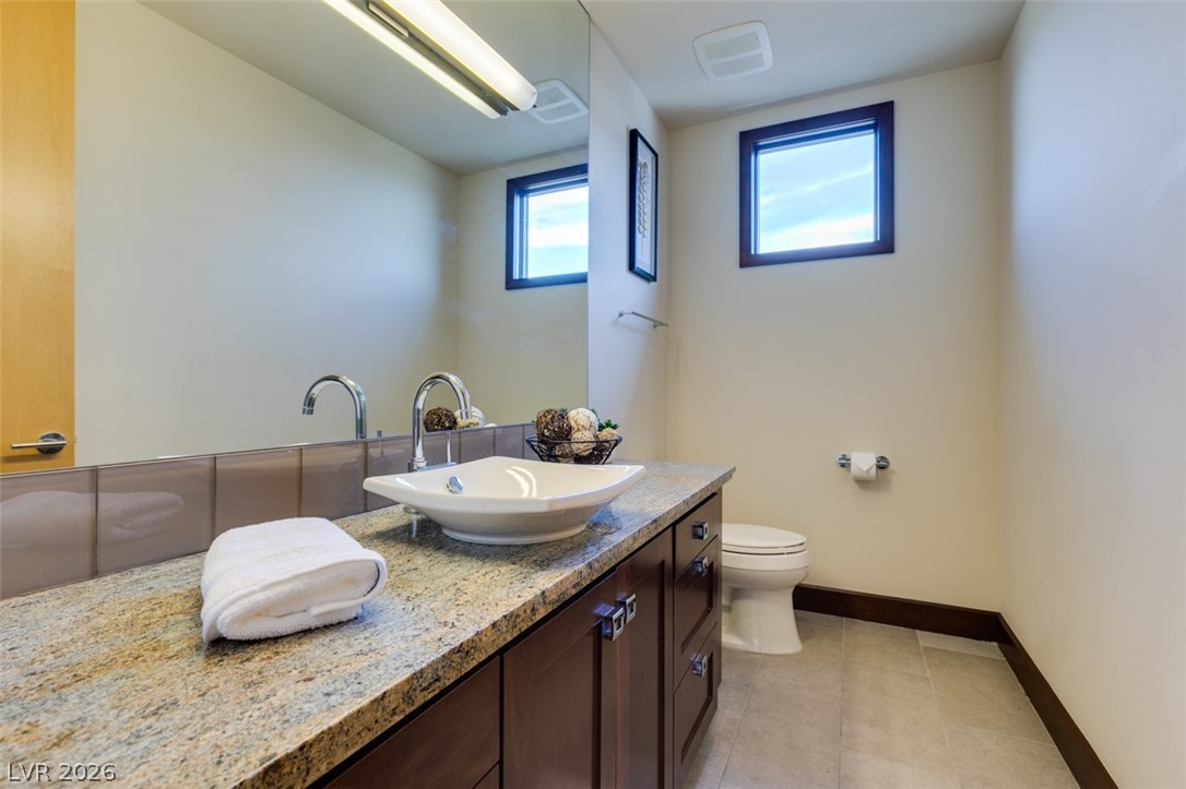 483 Toucan Ridge Court Henderson, NV 89012 - Photo 48 of 62 1/2 bath upstairs