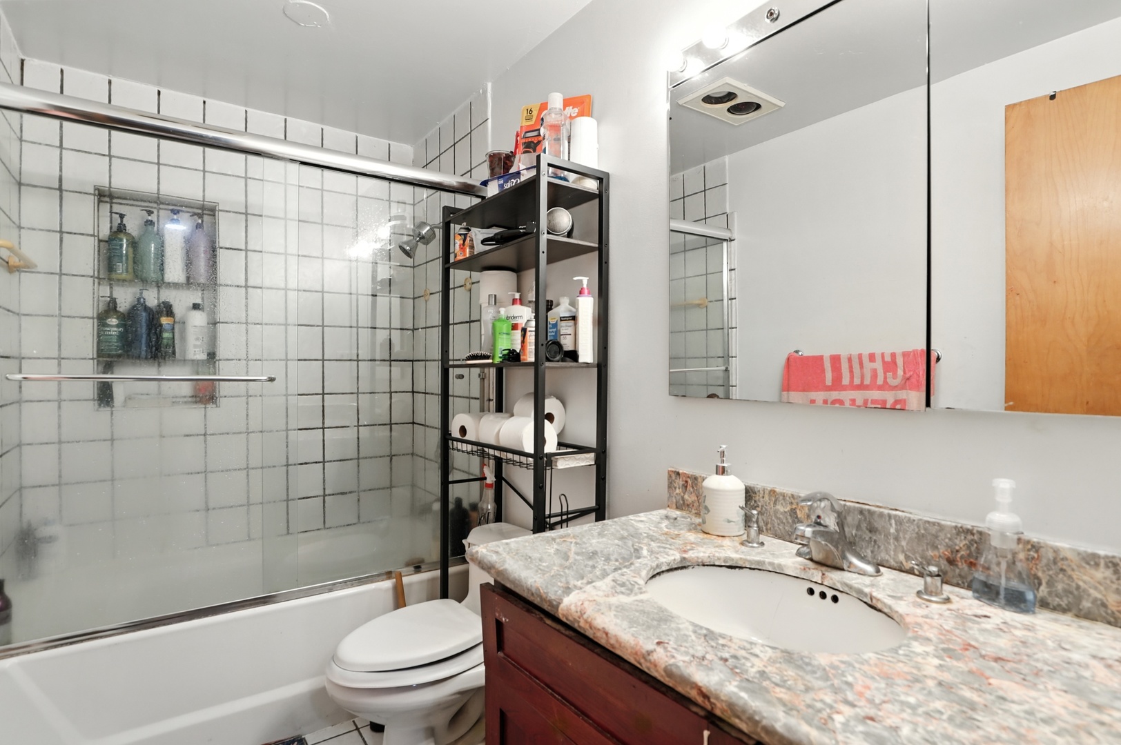 3814 Sherwin Avenue Lincolnwood, IL 60712 - Photo 14 of 21 a bathroom with a granite countertop sink toilet and shower