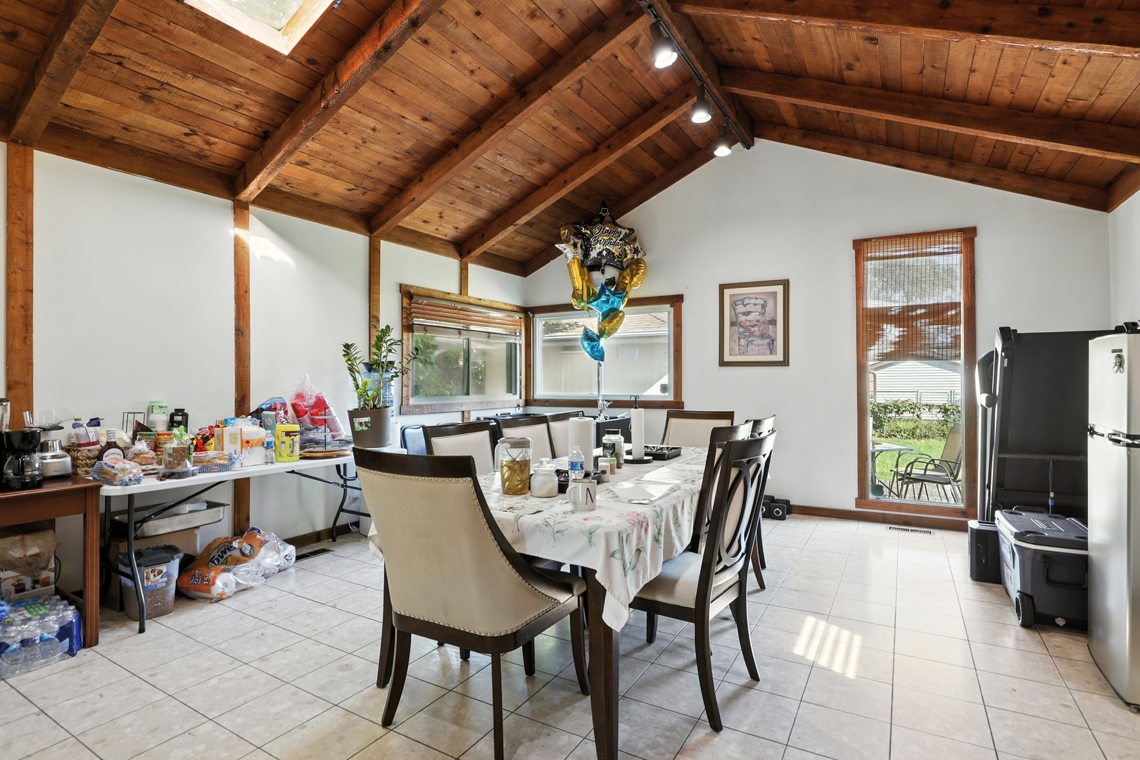 3814 Sherwin Avenue Lincolnwood, IL 60712 - Photo 8 of 21 a dining room with a large window and furniture