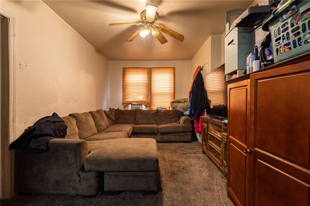 832 Broadway Avenue McKees Rocks, PA 15136 - Photo 17 of 48 a living room with furniture a air conditioner vent and a window