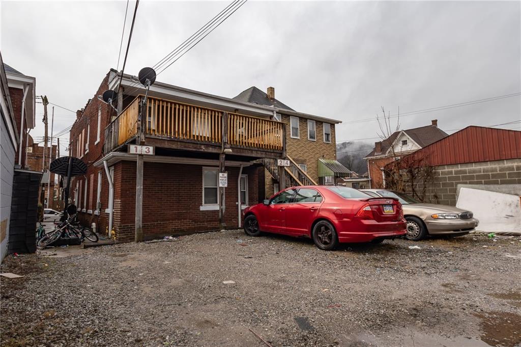 832 Broadway Avenue McKees Rocks, PA 15136 - Photo 26 of 48 a front view of a house with parking space