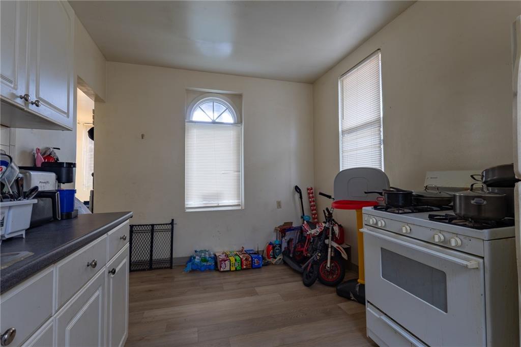 832 Broadway Avenue McKees Rocks, PA 15136 - Photo 29 of 48 a view of a kitchen with appliances and cabinets