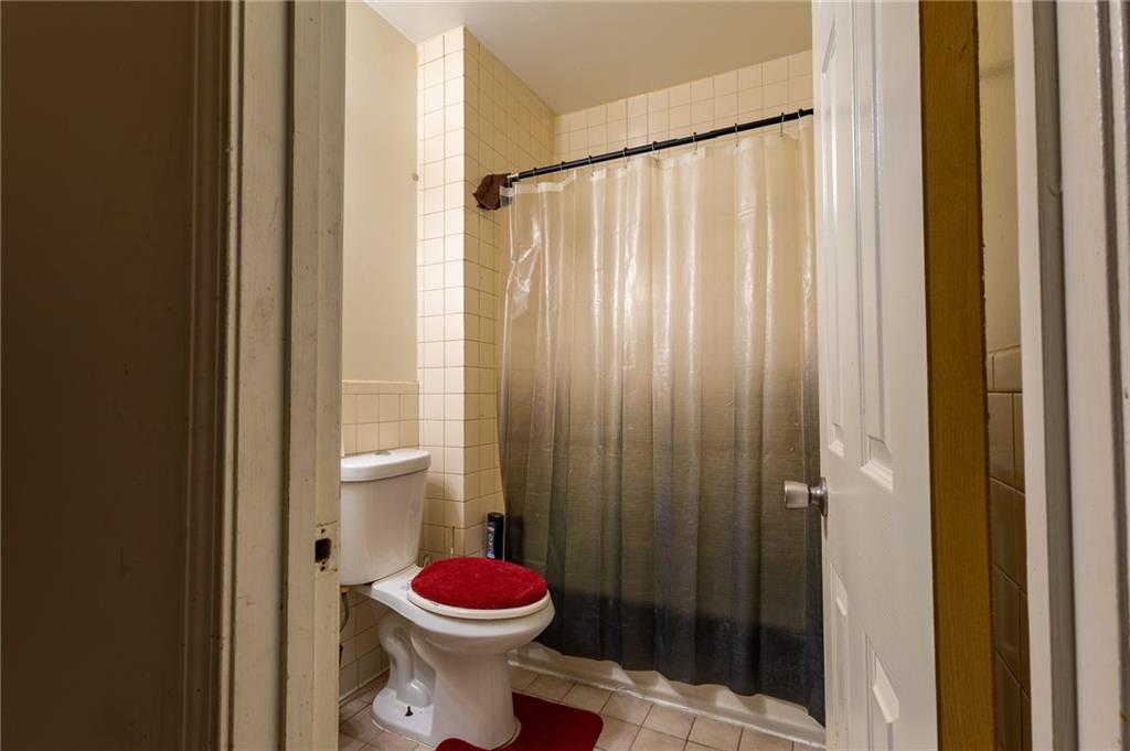 832 Broadway Avenue McKees Rocks, PA 15136 - Photo 31 of 48 a bathroom with a sink and toilet
