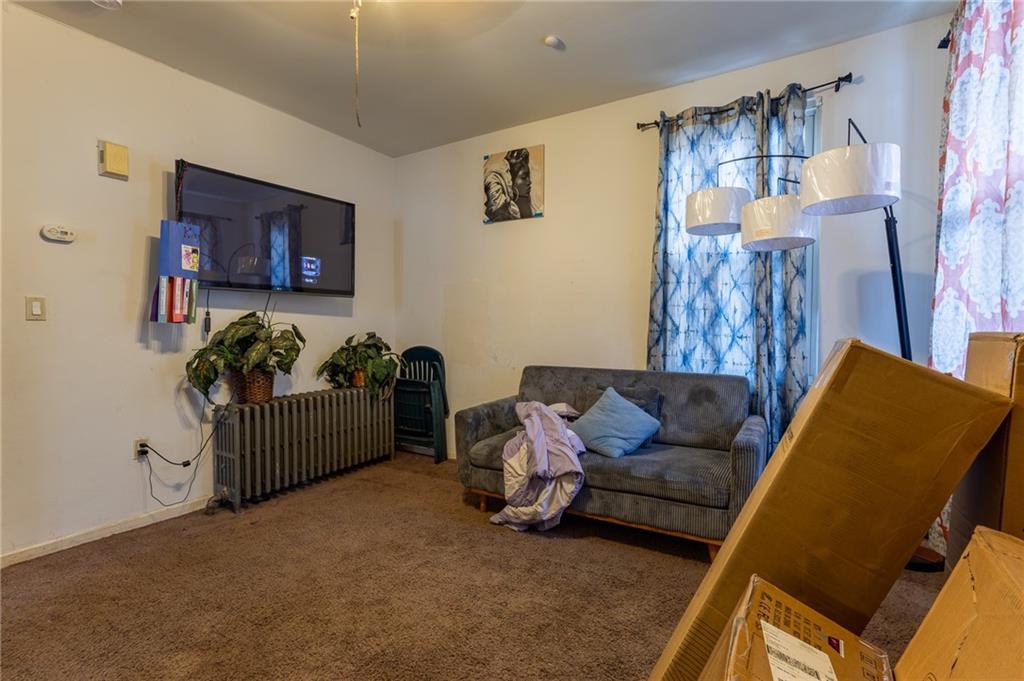 832 Broadway Avenue McKees Rocks, PA 15136 - Photo 38 of 48 a living room with furniture and a window
