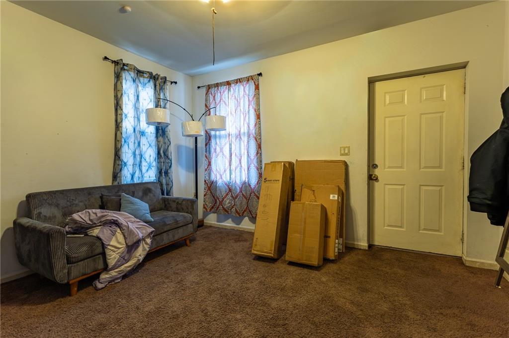 832 Broadway Avenue McKees Rocks, PA 15136 - Photo 39 of 48 a living room with furniture and a flat screen tv