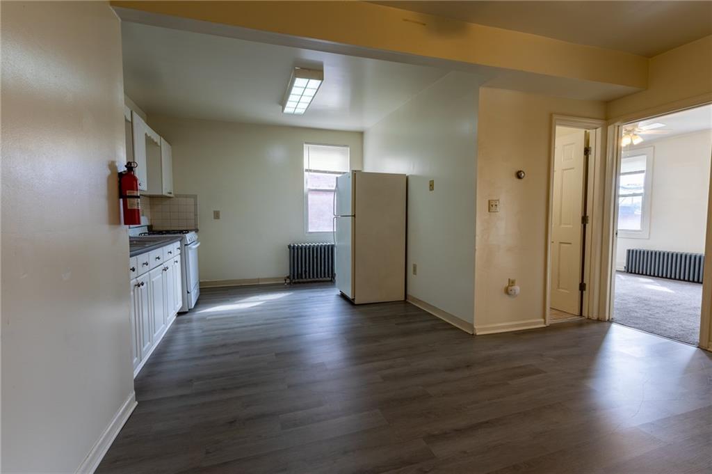 832 Broadway Avenue McKees Rocks, PA 15136 - Photo 5 of 48 a kitchen with stainless steel appliances granite countertop a refrigerator and a sink