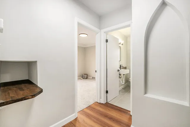 a view of a bathroom with a tub and shower