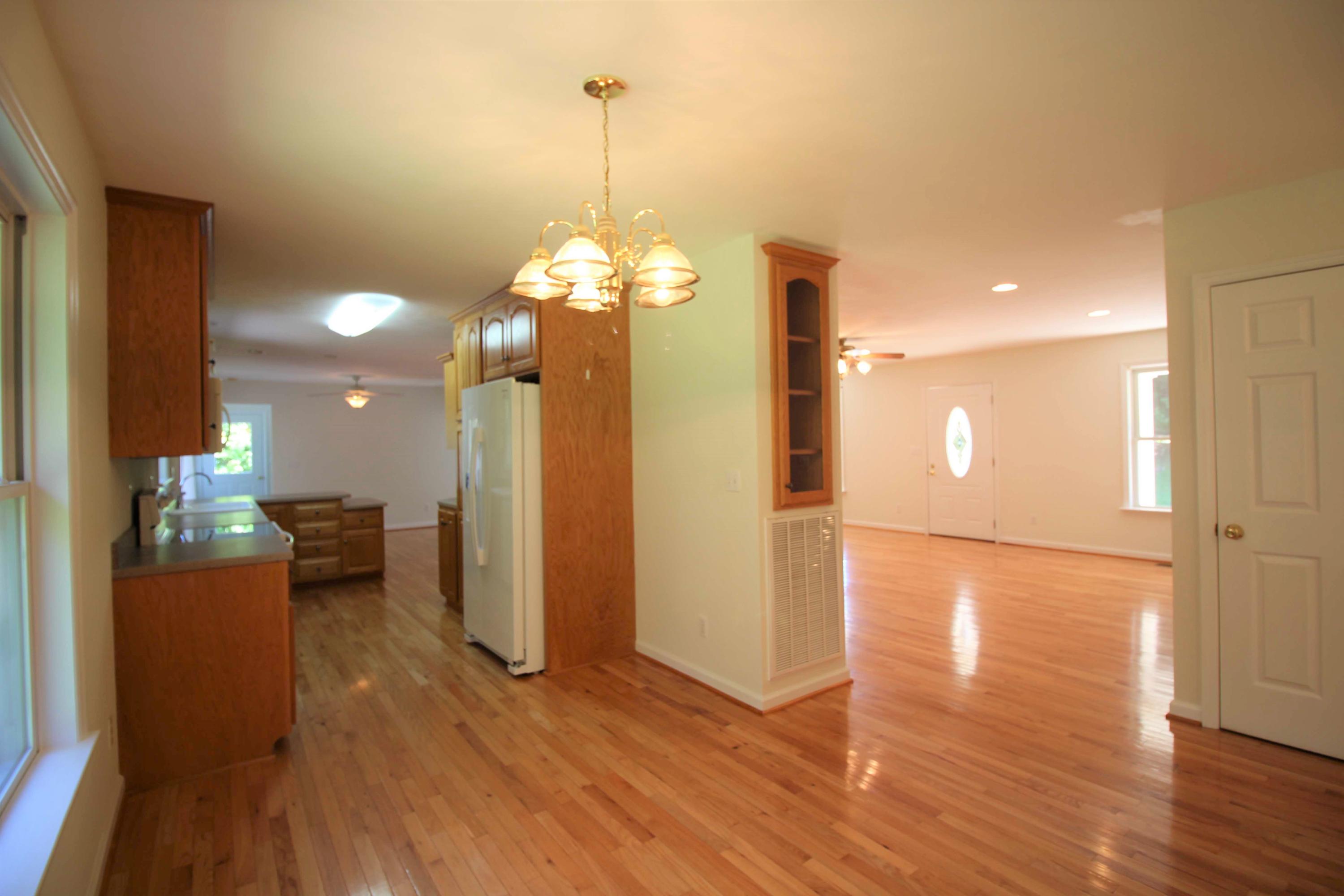415 Green Level Road Boones Mill, VA 24065 - Photo 48 of 48 a view of a livingroom with a chandelier