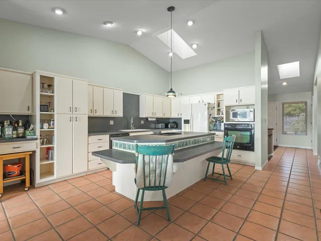 a view of livingroom with window and chandelier