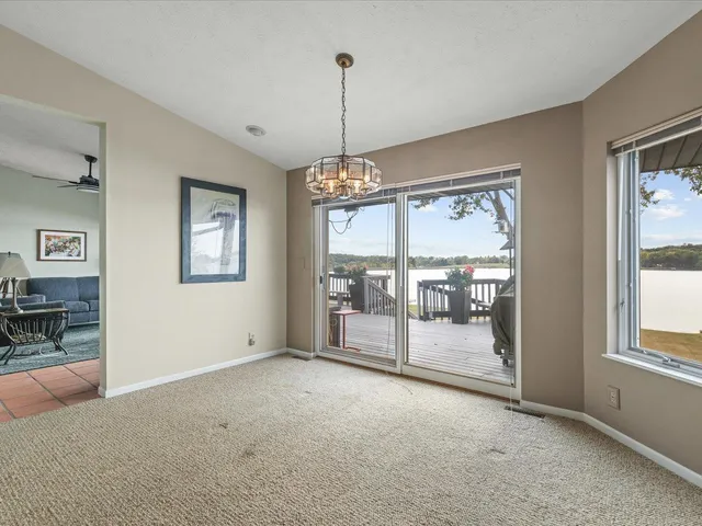 a kitchen with a sink and a stove top oven