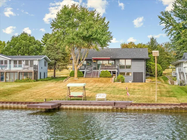 a front view of a house with swimming pool