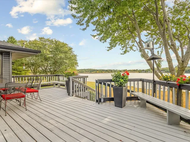 a view of a swimming pool with an ocean view