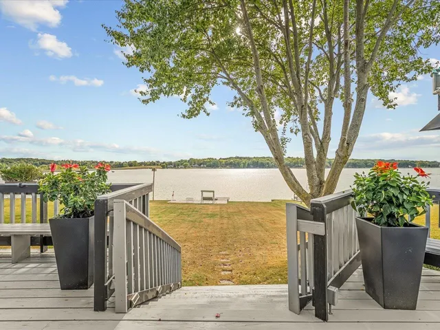a large kitchen with a stove a refrigerator and a stove