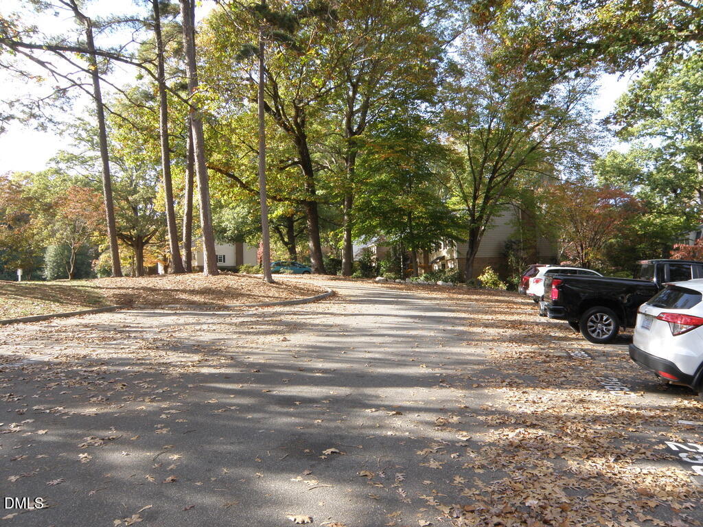 2858 Wycliff Road Raleigh, NC 27607 - Photo 2 of 26 a building with trees in front of it