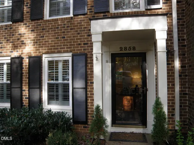 a building with a window and a glass door