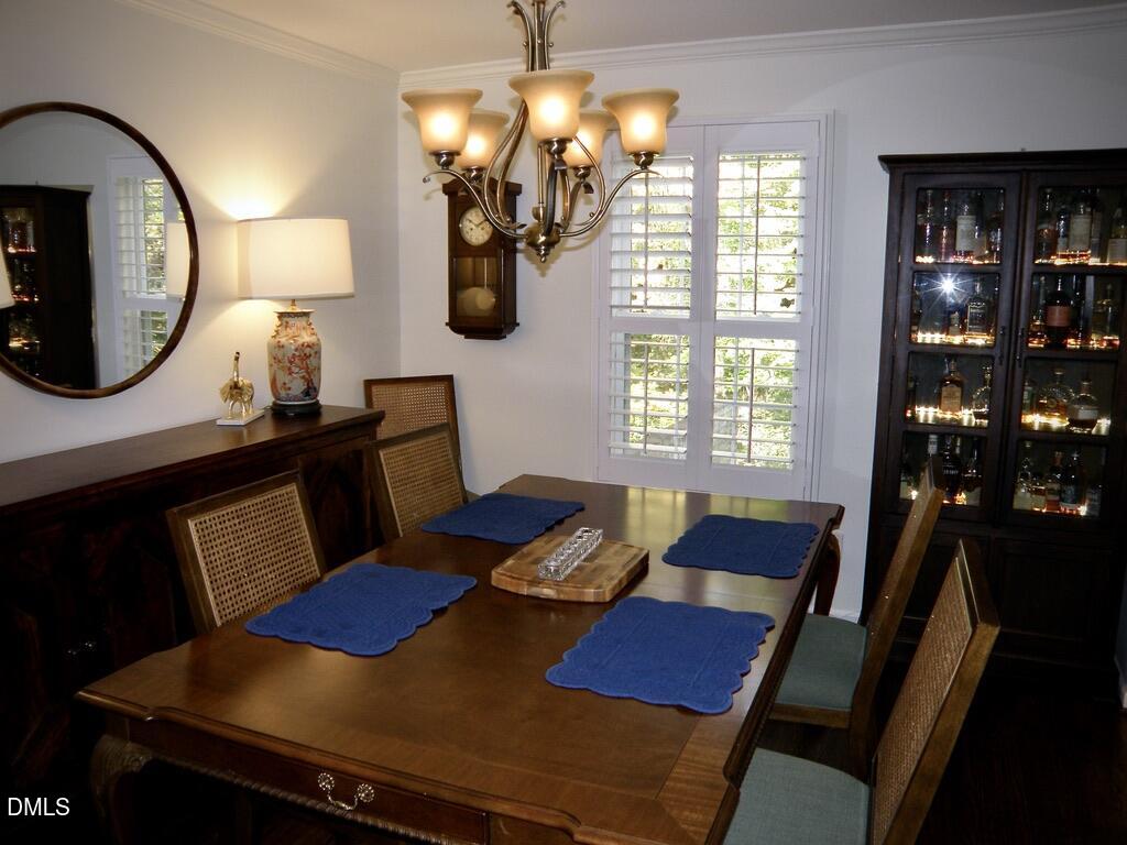 2858 Wycliff Road Raleigh, NC 27607 - Photo 8 of 26 a view of a workspace with furniture and a window