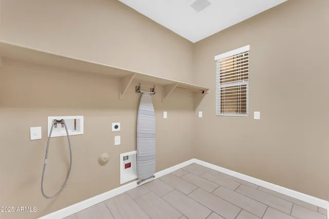 a view of a balcony with a floor to ceiling windows and yard