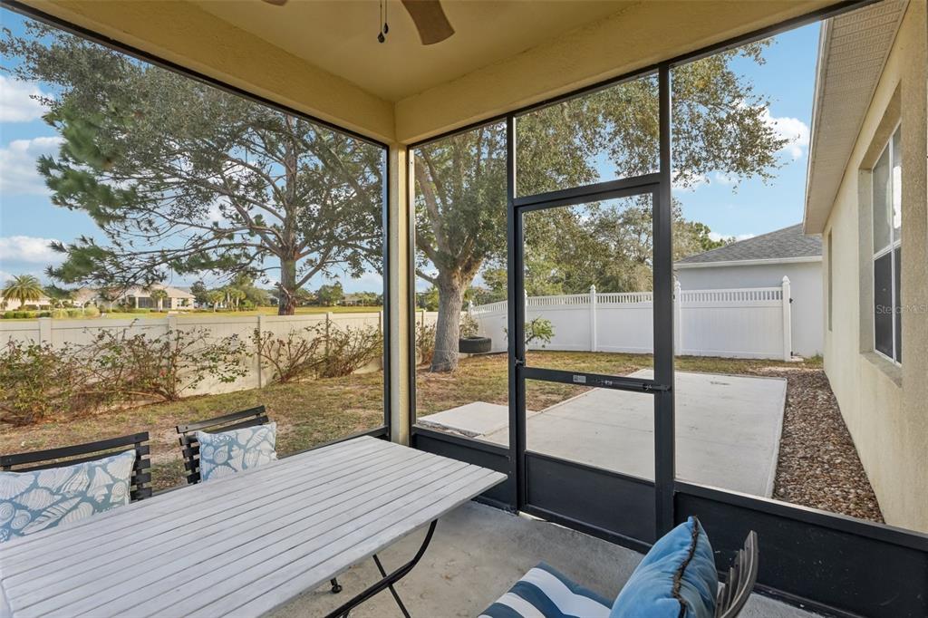 1689 Strathmore Circle Mount Dora, FL 32757 - Photo 31 of 37 a view of a balcony with lake view and wooden floor