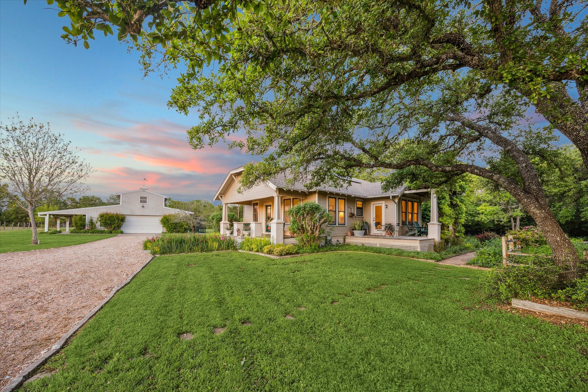 2915 Schulle Road Round Top, TX 78954 - Photo 41 of 50 View of the house and garage from the driveway entry.