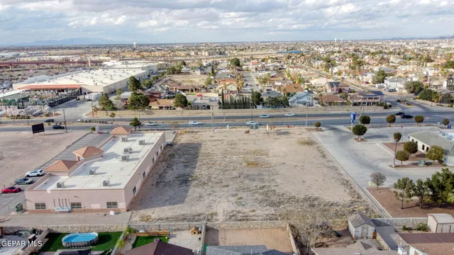 a view of swimming pool with outdoor seating