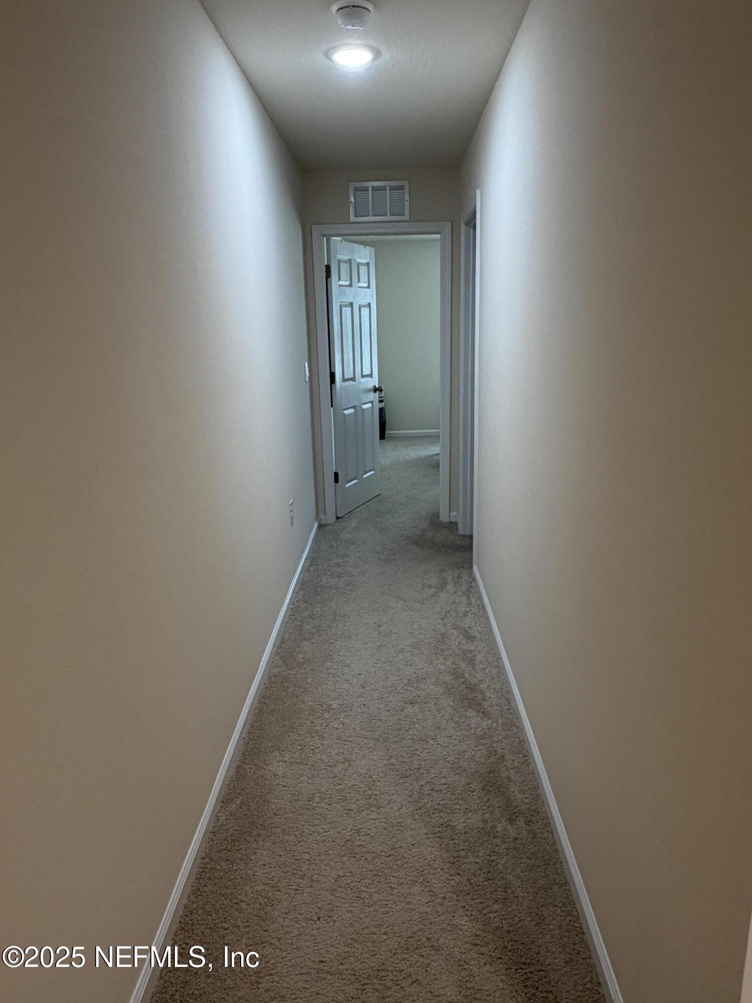 64 Java Lane St. Augustine, FL 32092 - Photo 17 of 38 a view of hallway with window