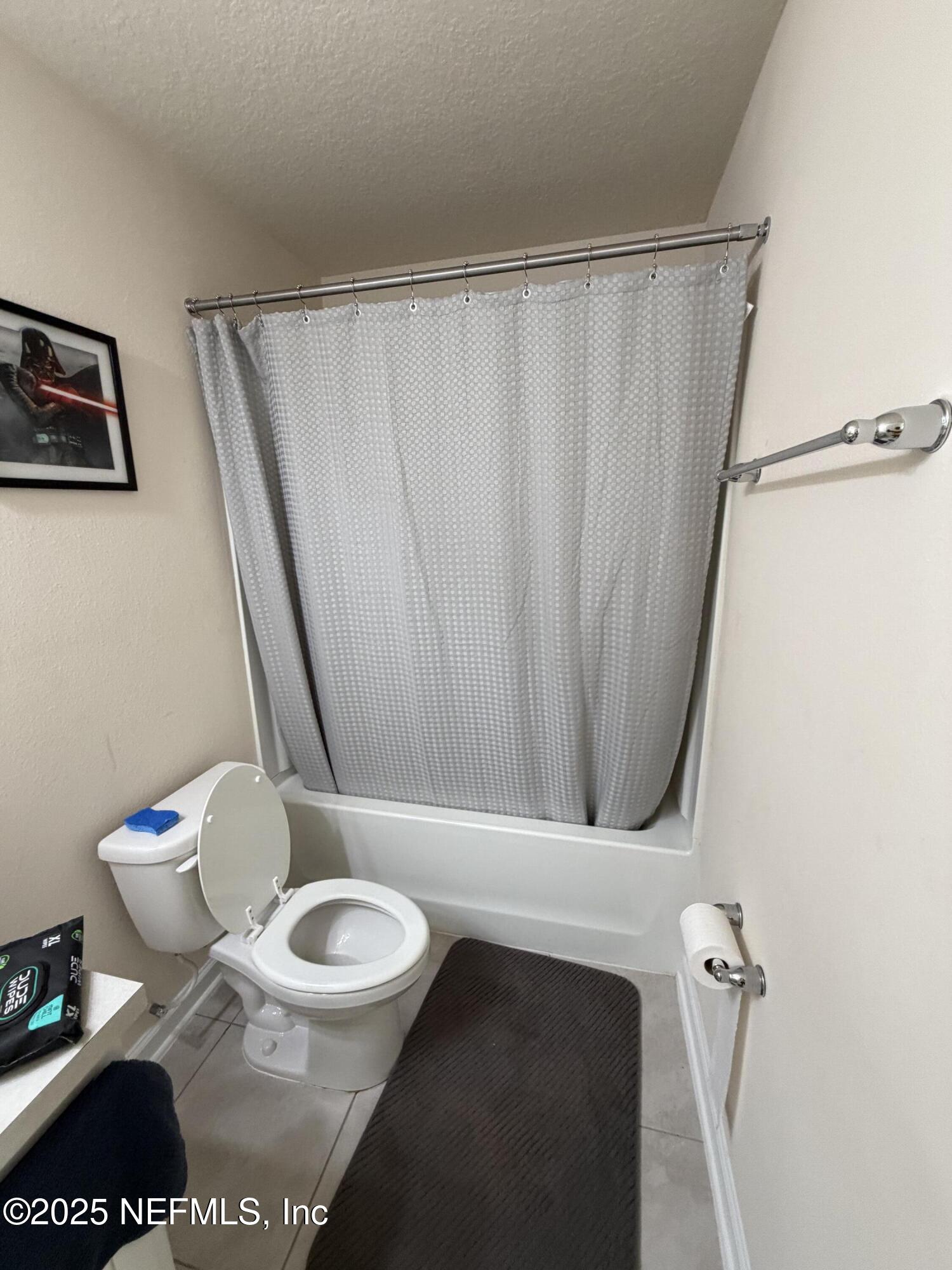 64 Java Lane St. Augustine, FL 32092 - Photo 22 of 38 a bathroom with a toilet and a shower