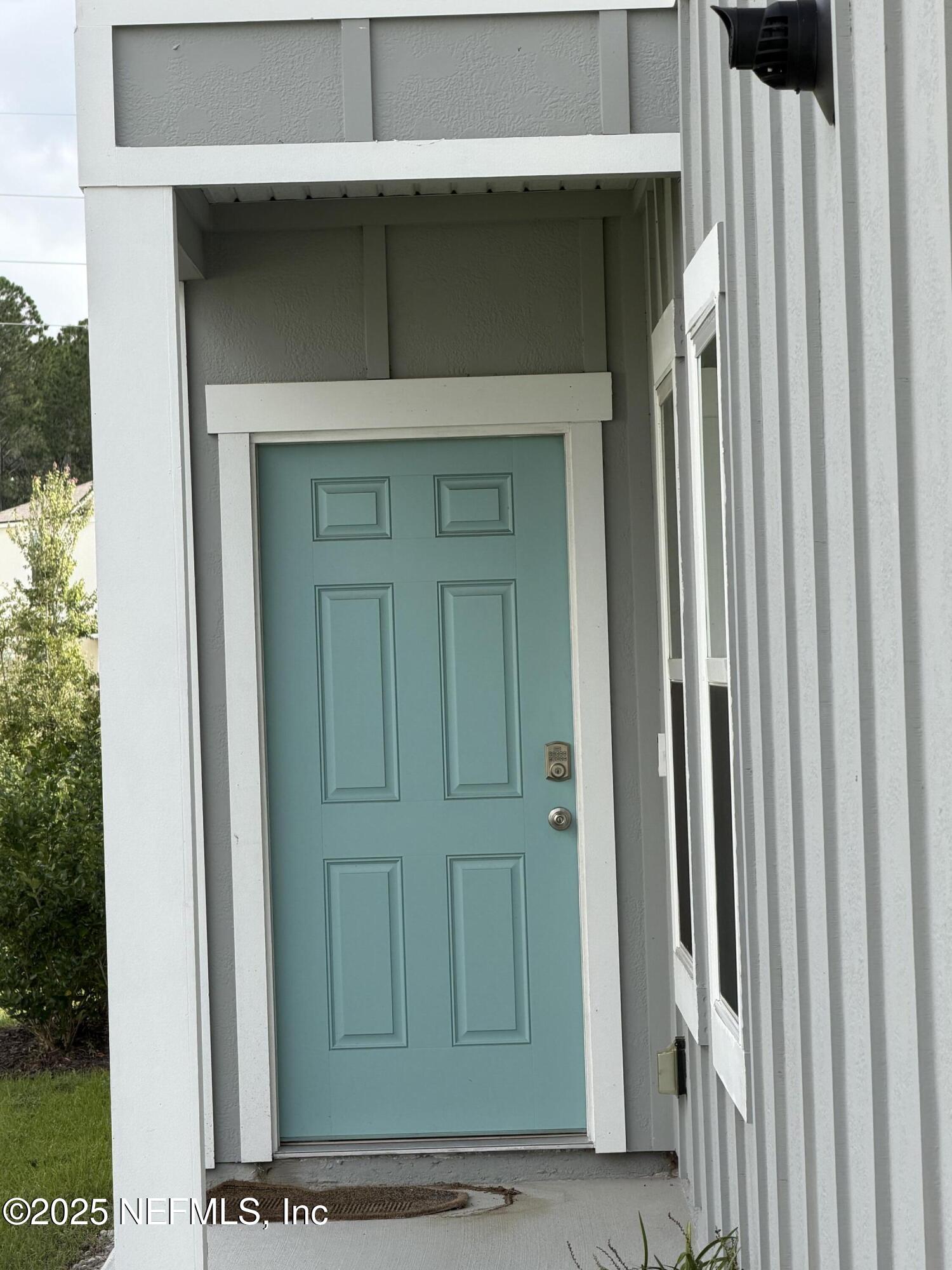 64 Java Lane St. Augustine, FL 32092 - Photo 3 of 38 a view of a door of the house