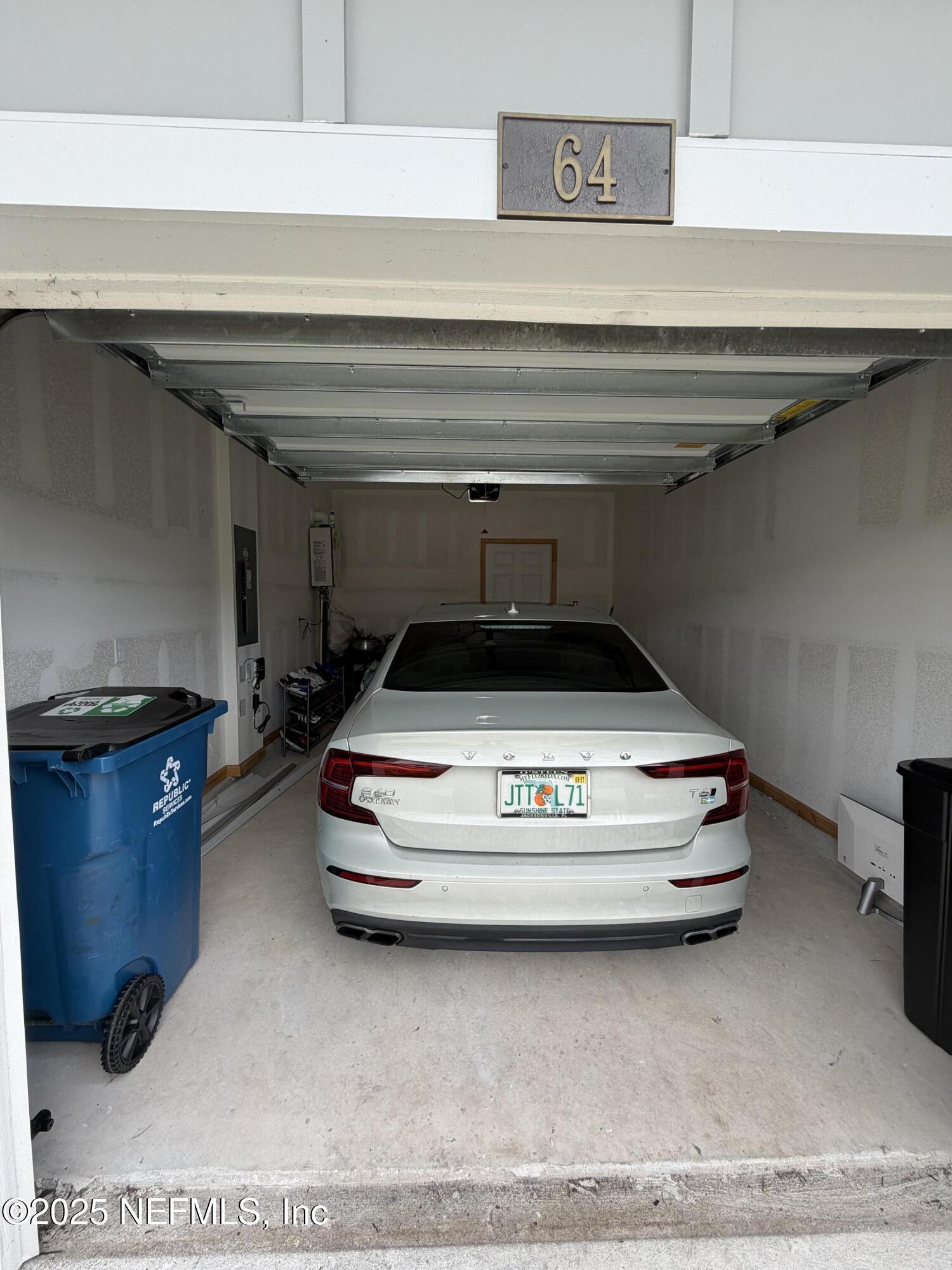 64 Java Lane St. Augustine, FL 32092 - Photo 33 of 38 a car parked in a garage