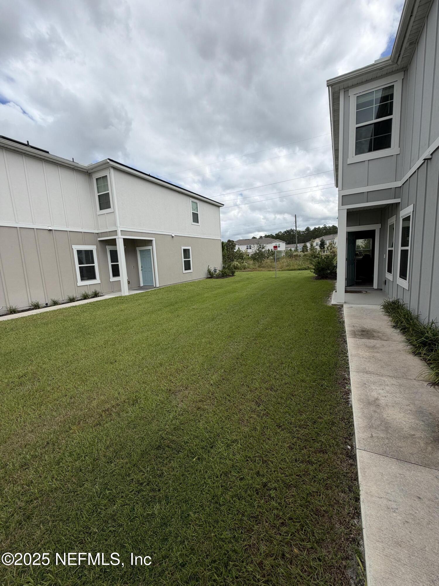 64 Java Lane St. Augustine, FL 32092 - Photo 34 of 38 a house view with garden space
