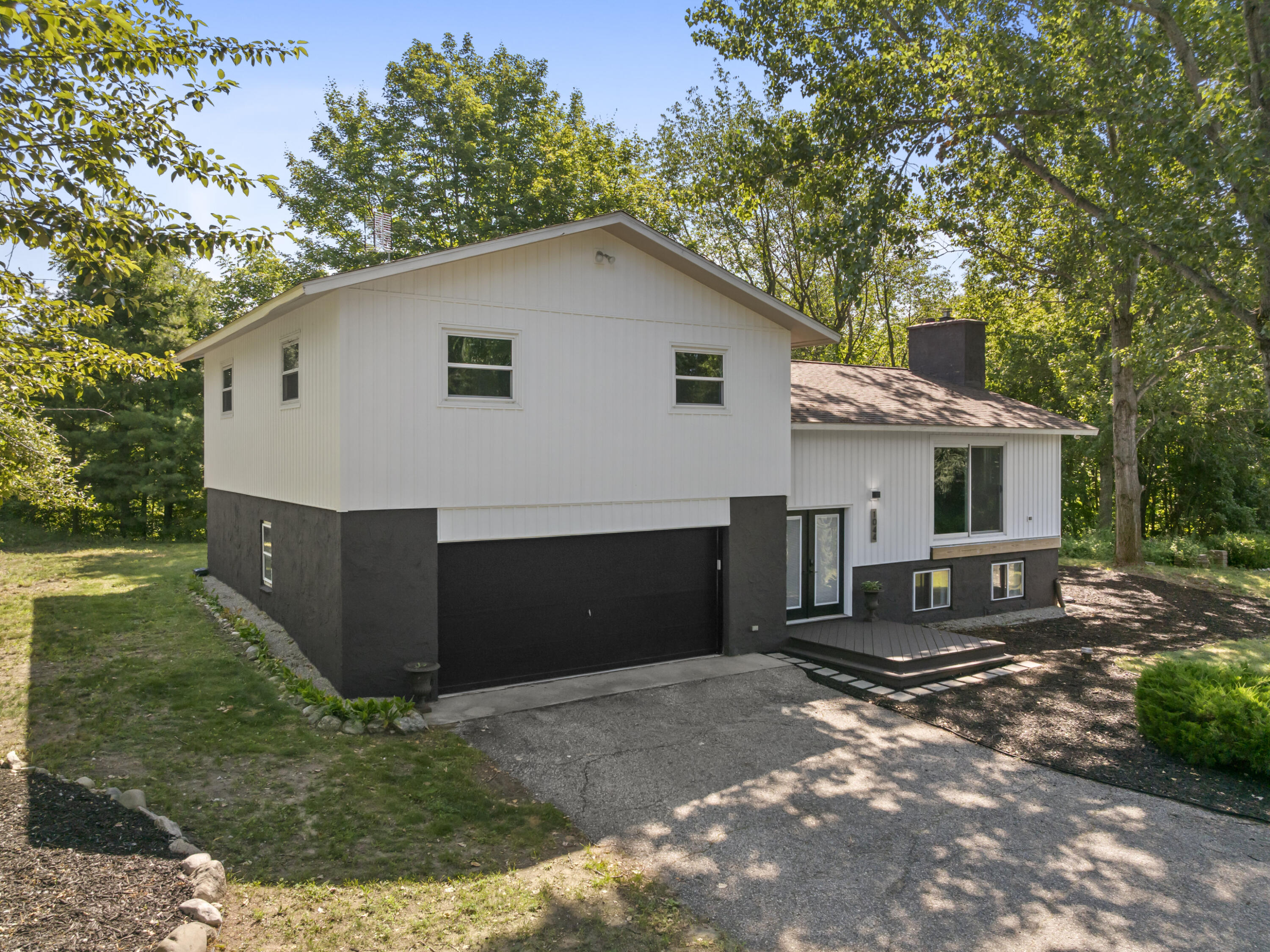 1044 Edenhill Road Beulah, MI 49617 - Photo 2 of 44 DJI_20260803113844_0015_D