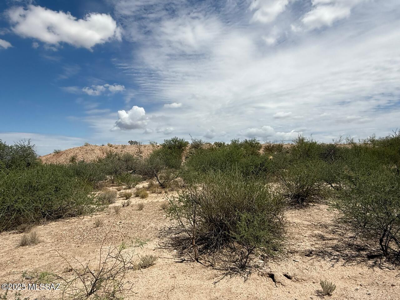 9.93-ac South Lonesome Road Benson, AZ 85602 - Photo 5 of 15 View from wash towards back of hill top pad.