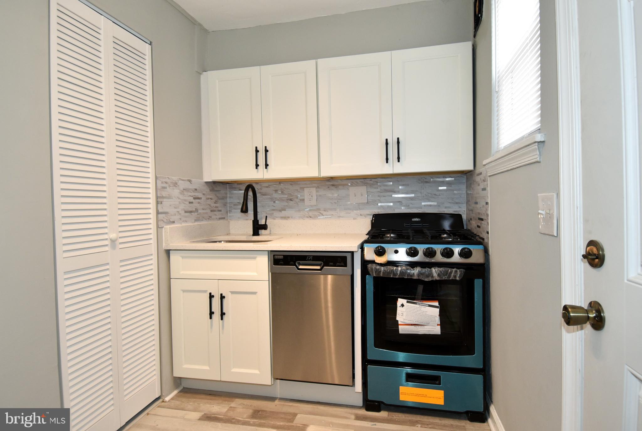 8208 Bellefonte Lane, Unit 5 Clinton, MD 20735 - Photo 7 of 17 Charming kitchen with modern finishes.