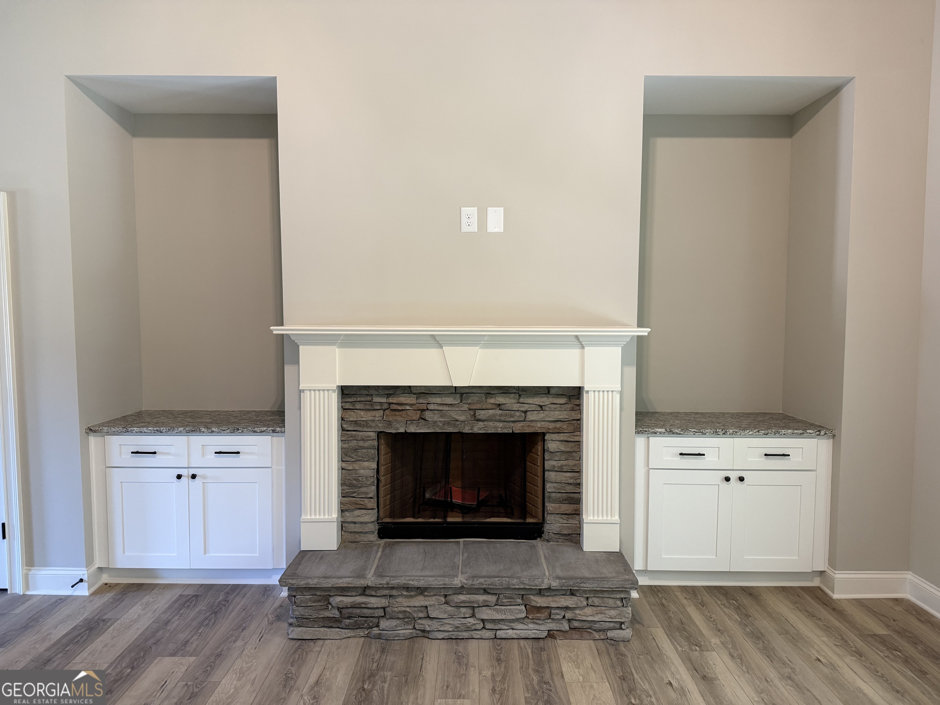 92 Commanche Circle Williamson, GA 30292 - Photo 19 of 53 a living room with a fireplace