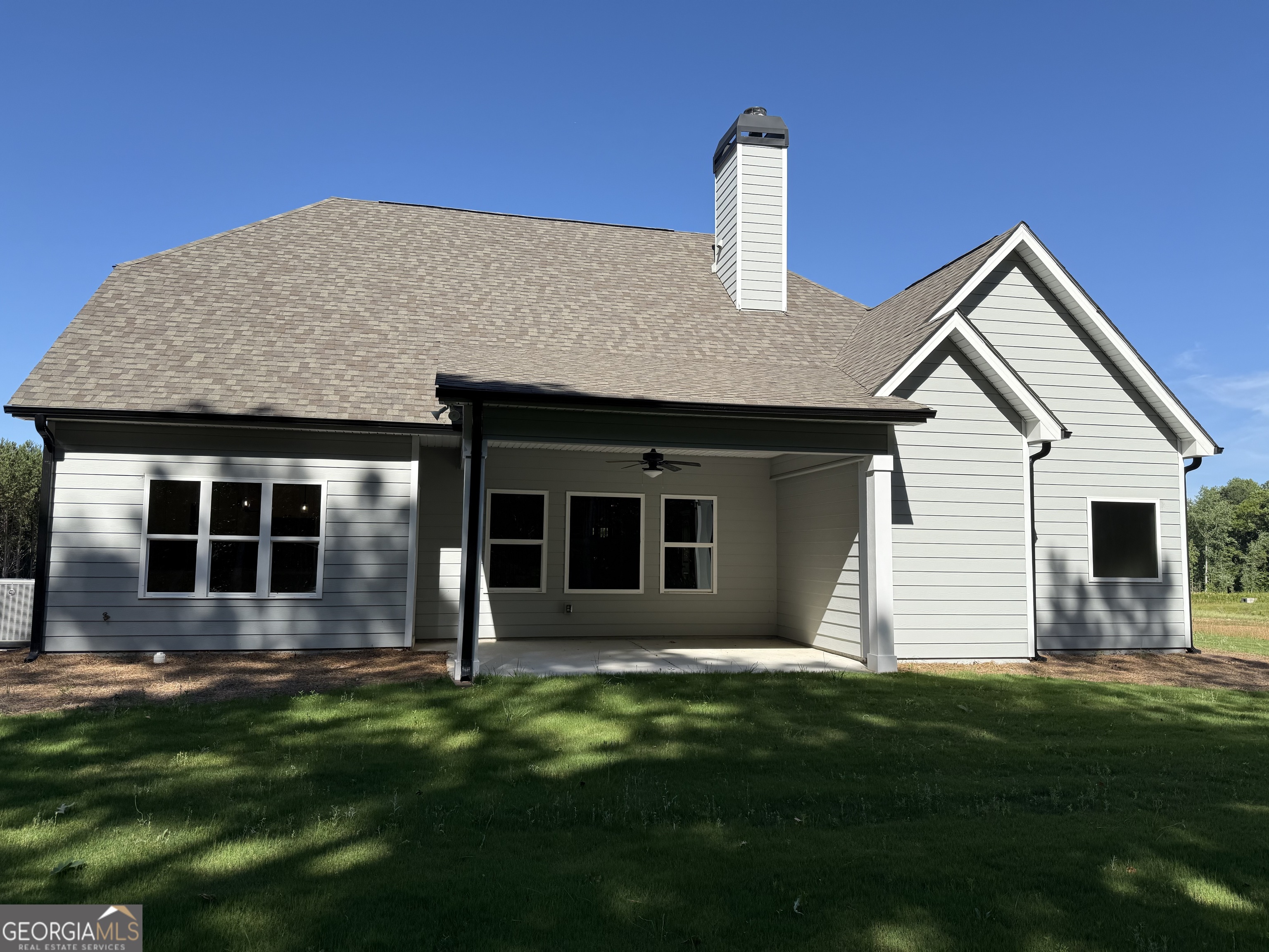 92 Commanche Circle Williamson, GA 30292 - Photo 2 of 53 a view of a house with yard