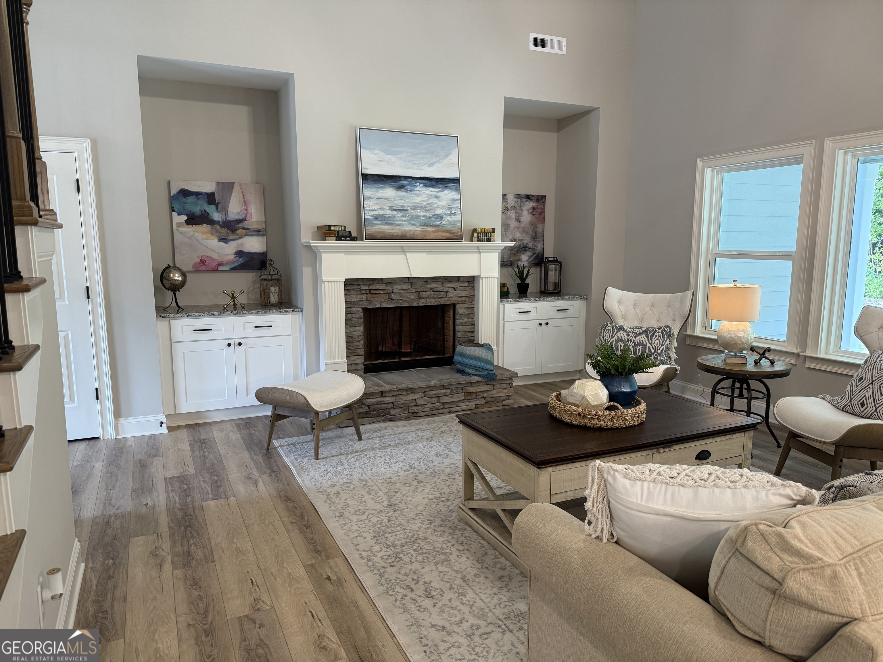 92 Commanche Circle Williamson, GA 30292 - Photo 21 of 53 a living room with furniture and a fireplace