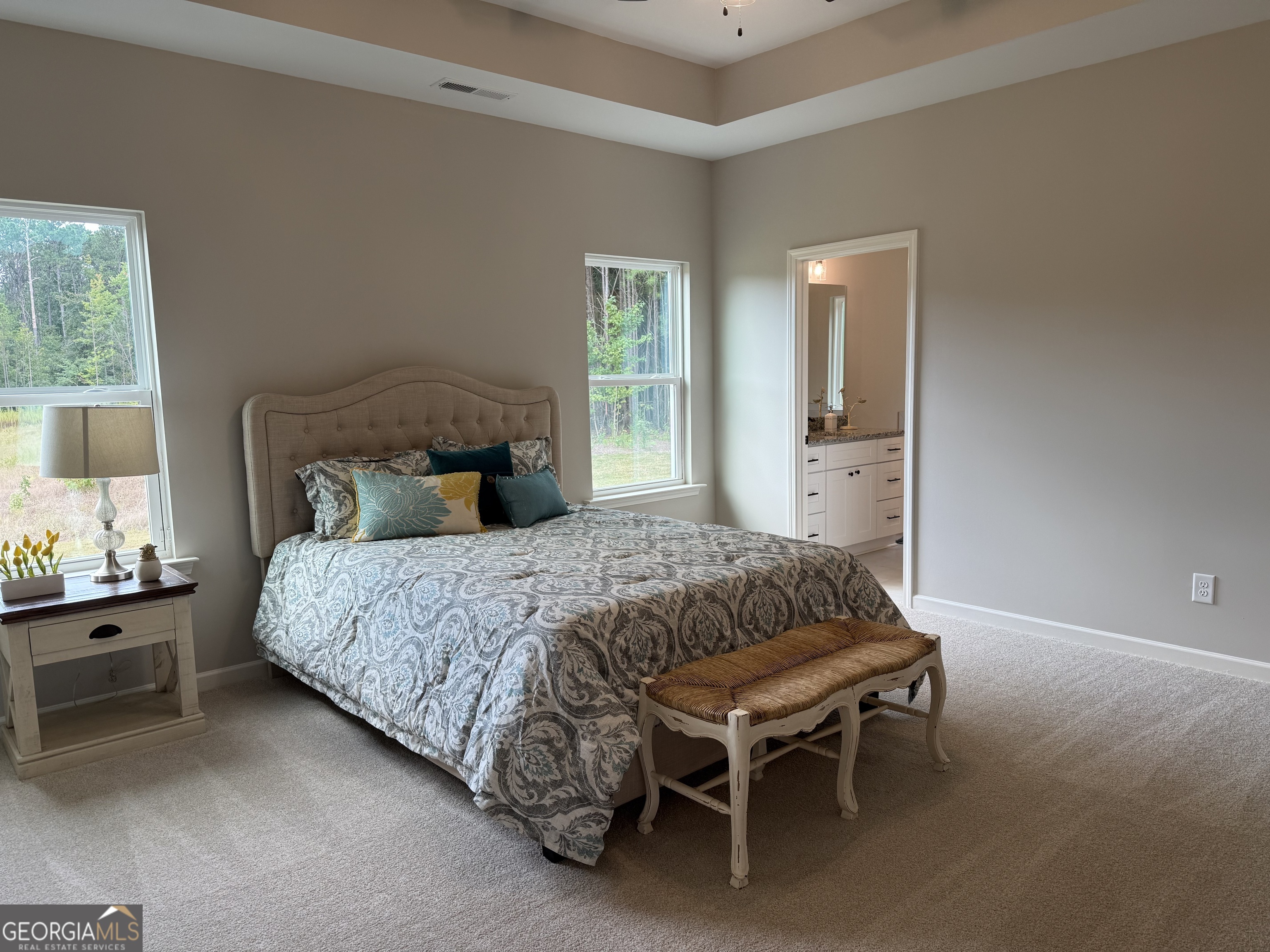 92 Commanche Circle Williamson, GA 30292 - Photo 34 of 53 a bedroom with a bed and window